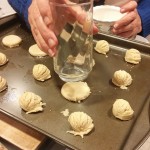 Tamp down each dough ball to a quarter inch thick