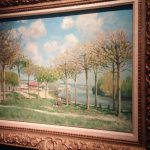 A charming Sisley landscape with river