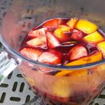 Colorful fruit soaking in red wine