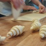 Croissants being shaped