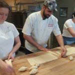 Stretching and rolling the croissant dough