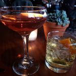 A Mezcal Manhattan (L) and a La Gracia cocktail