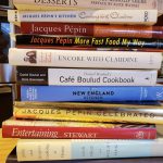 2. A stack of restaurant cookbooks